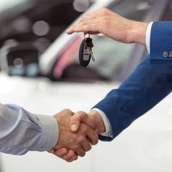Shaking hands with car keys